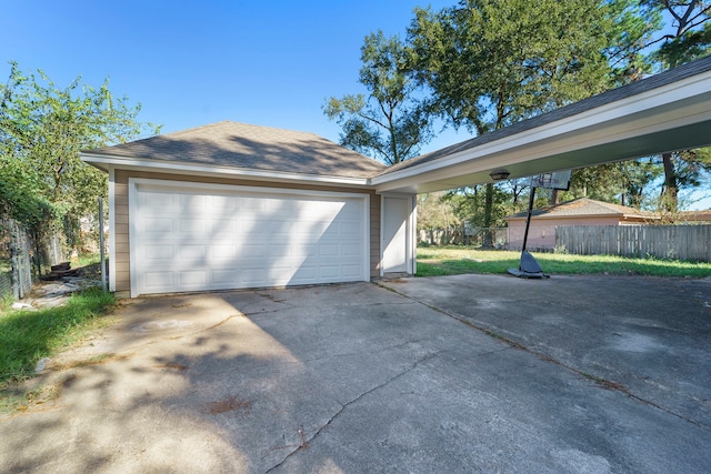 garage featuring a yard