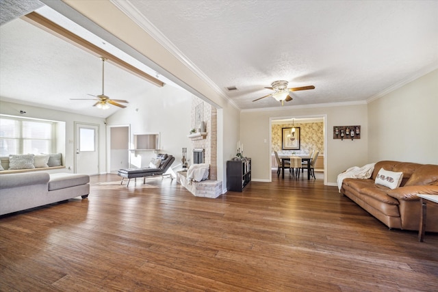 living room featuring a fireplace, ceiling fan, lofted ceiling, and dark wood-type flooring