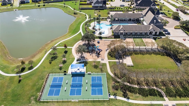 birds eye view of property featuring a water view