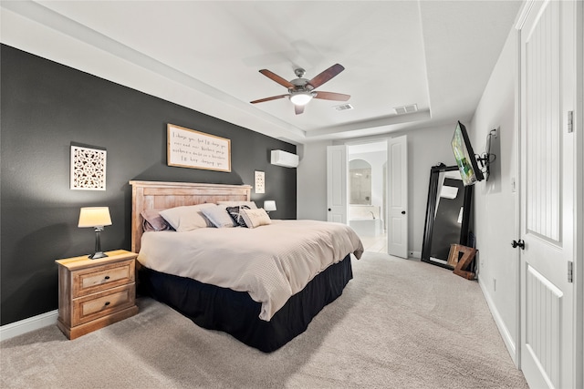 carpeted bedroom with connected bathroom and ceiling fan