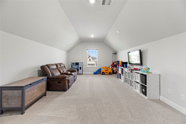 game room featuring light colored carpet and lofted ceiling