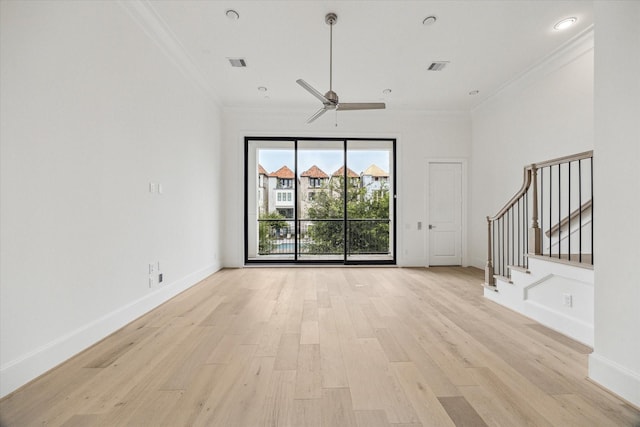 7523 Cuadro Ln, Houston, TX 77055 - unfurnished living room featuring crown molding, light wood-type flooring, stairs, ceiling fan, and baseboards