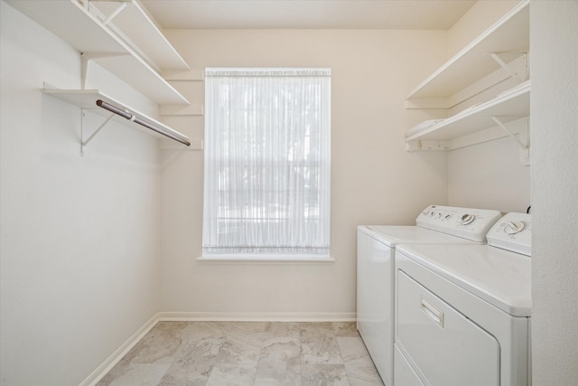 washroom featuring separate washer and dryer