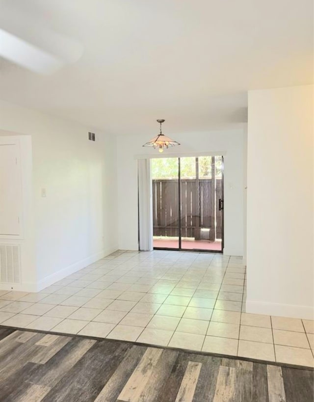 unfurnished room featuring light hardwood / wood-style floors