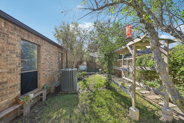 view of yard featuring central AC unit