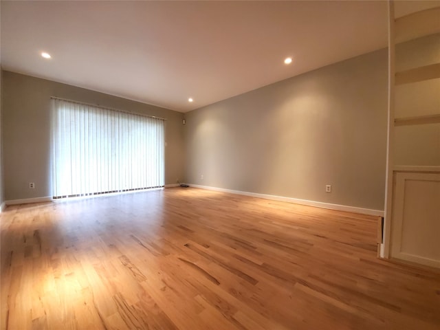 unfurnished room featuring light hardwood / wood-style flooring