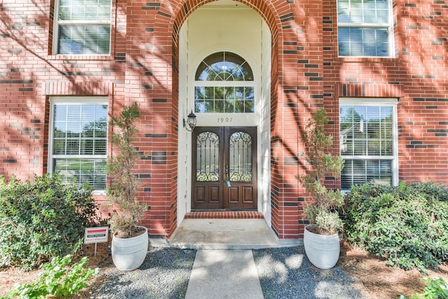 doorway to property featuring french doors