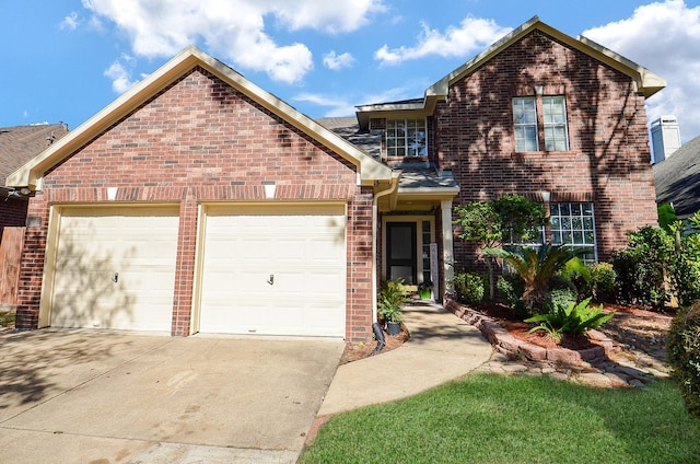 front of property with a garage