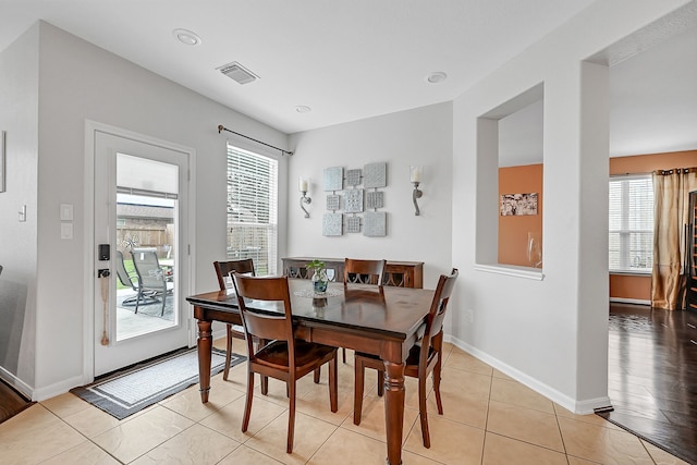 dining room featuring light hardwood / wood-style floors