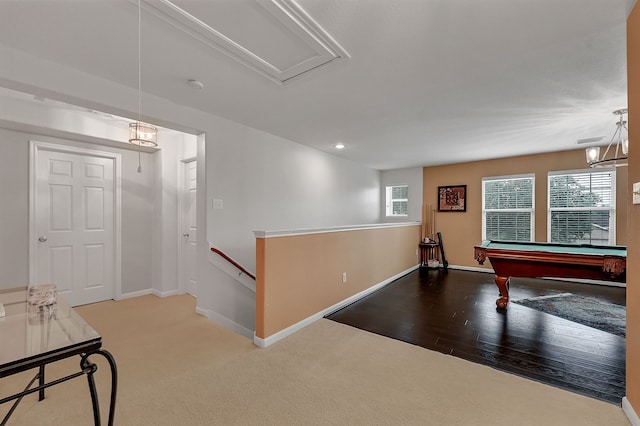 rec room featuring a wealth of natural light, hardwood / wood-style floors, and billiards