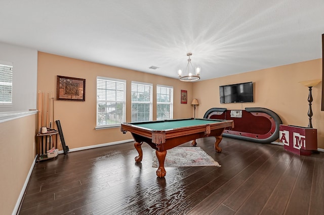 playroom featuring a notable chandelier, dark hardwood / wood-style flooring, and billiards