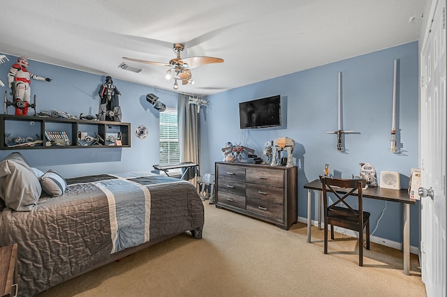 bedroom with light colored carpet and ceiling fan