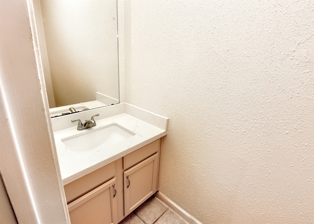 bathroom featuring tile patterned floors and vanity