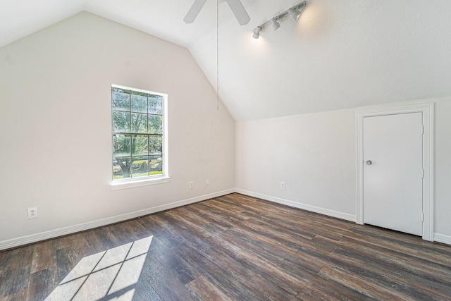 additional living space featuring ceiling fan, dark hardwood / wood-style flooring, and lofted ceiling