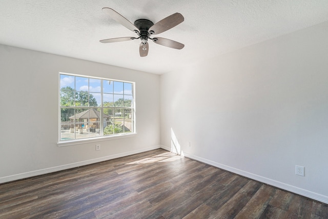 spare room featuring a textured ceiling, dark hardwood / wood-style flooring, and ceiling fan