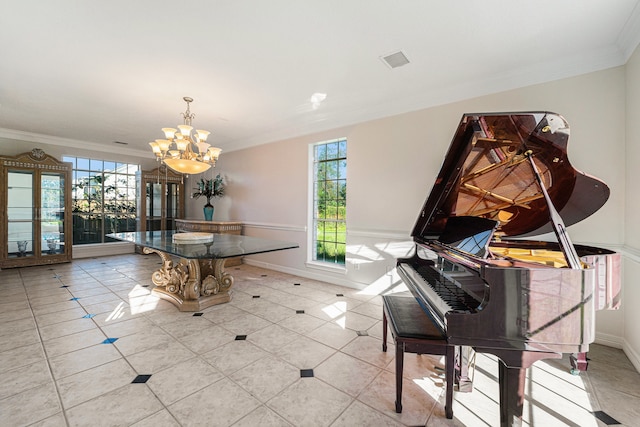 dining room featuring a healthy amount of sunlight, light tile patterned flooring, ornamental molding, and a chandelier