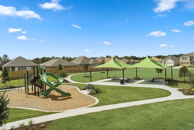 view of jungle gym with a lawn