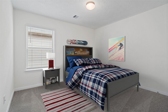 676 Imperial Loop, Alvin, TX 77511 - carpeted bedroom with baseboards and visible vents