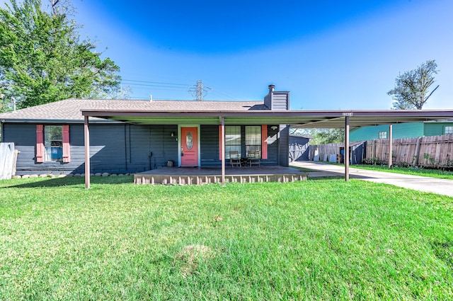 single story home featuring a front lawn