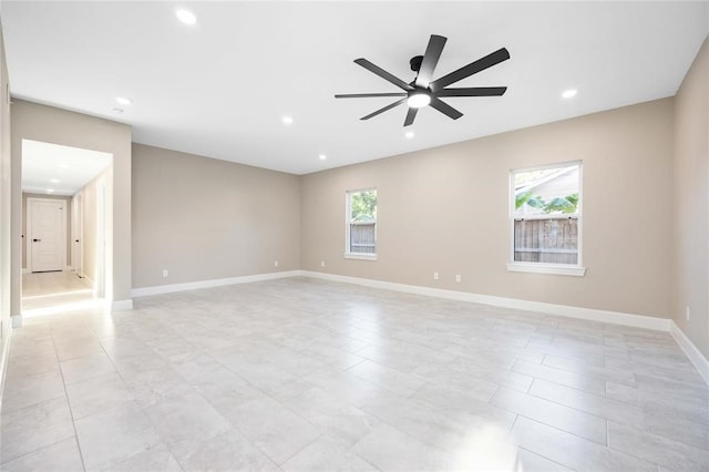 empty room featuring ceiling fan