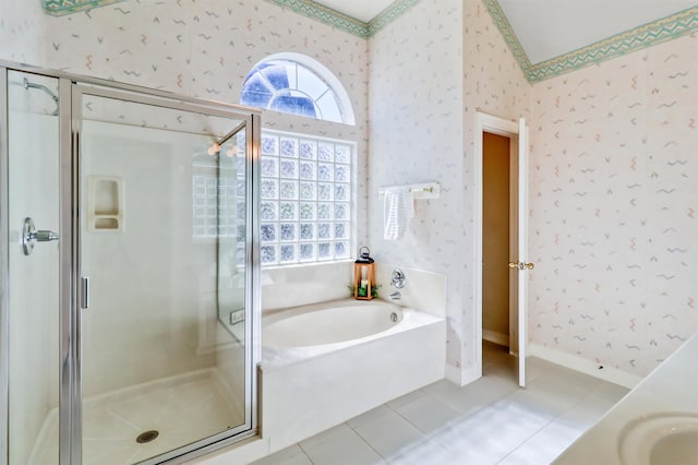 bathroom featuring tile patterned floors, vanity, and plus walk in shower