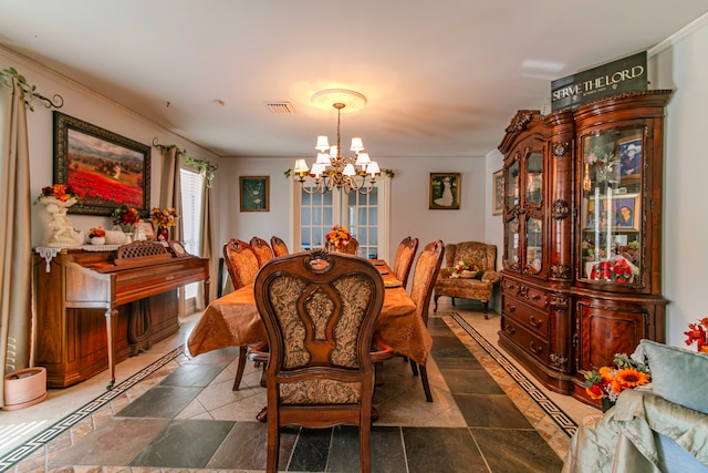 dining area featuring a notable chandelier