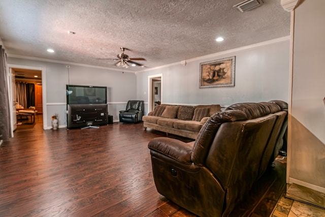 living room with a textured ceiling, dark hardwood / wood-style floors, ceiling fan, and crown molding