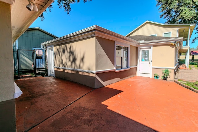 view of front of property with a patio