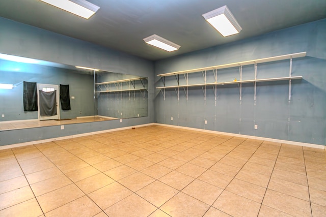 basement featuring tile patterned flooring