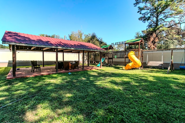 view of yard with a playground