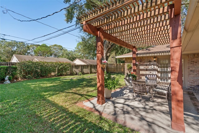 view of yard with a pergola and a patio area