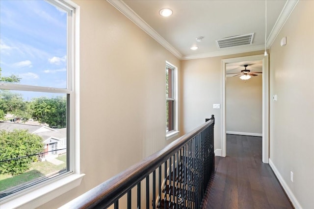 1516 Amundsen St, Houston, TX 77009 - hall with crown molding, dark wood-style floors, recessed lighting, and an upstairs landing