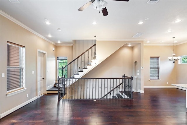 1516 Amundsen St, Houston, TX 77009 - foyer entrance featuring a ceiling fan, hardwood / wood-style floors, a chandelier, crown molding, and recessed lighting