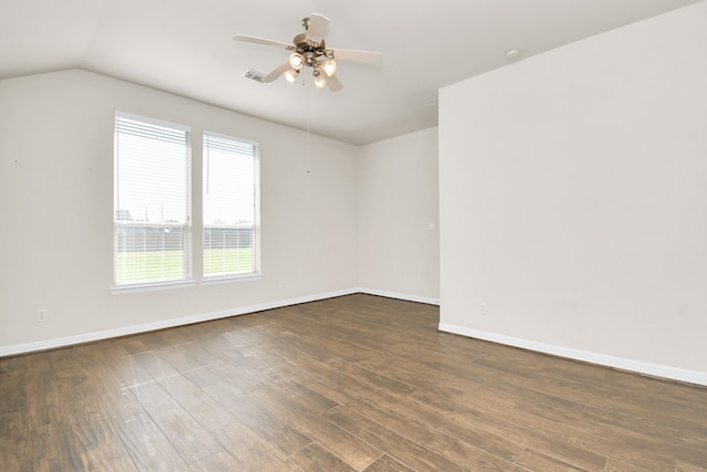 unfurnished room with vaulted ceiling, ceiling fan, and dark hardwood / wood-style floors