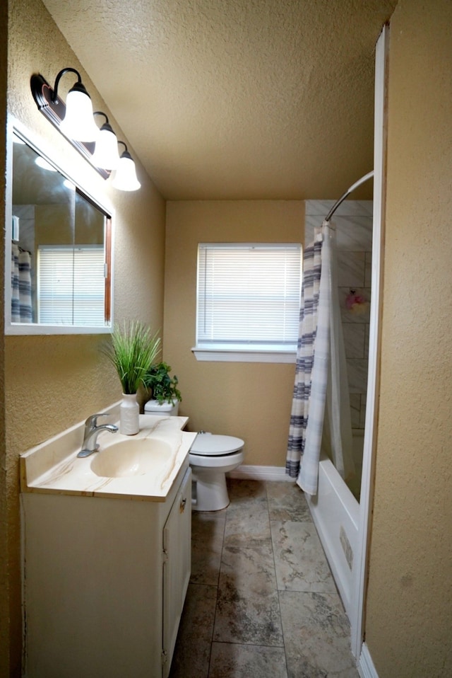 full bathroom with vanity, toilet, shower / bathtub combination with curtain, and a textured ceiling