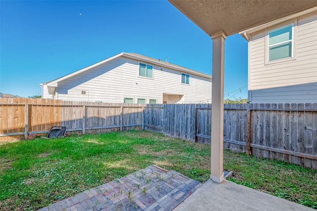 view of yard with a patio area