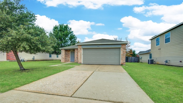 view of front of home with central AC and a front lawn