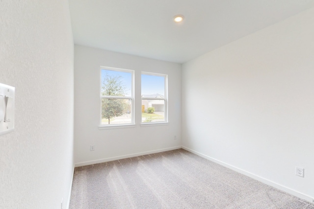 unfurnished room featuring carpet floors