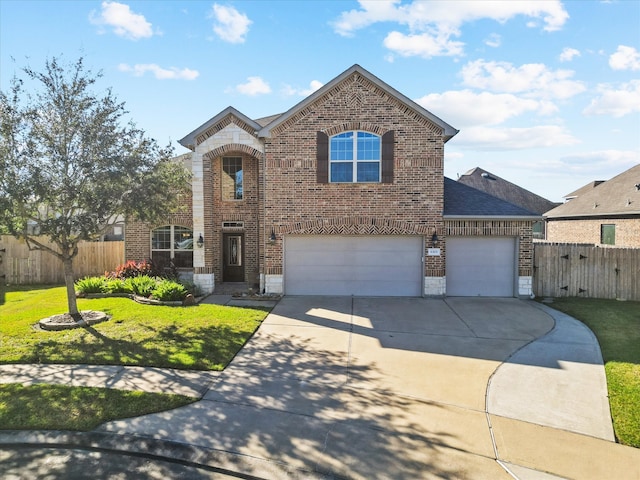 front of property with a garage and a front lawn