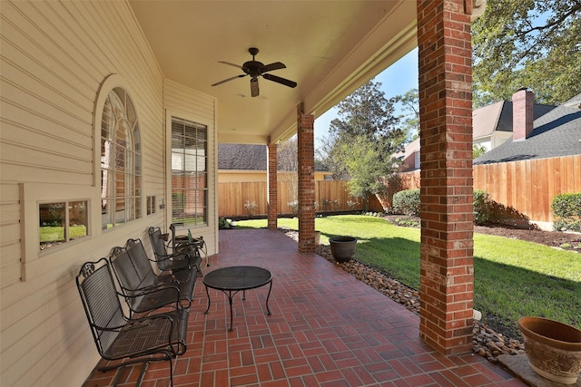 view of patio / terrace featuring ceiling fan