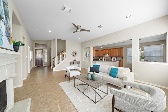 living room with ceiling fan