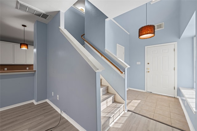 entryway with light hardwood / wood-style flooring