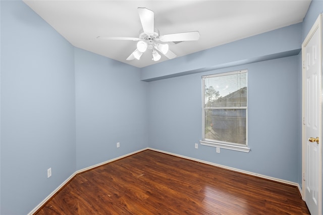 empty room featuring hardwood / wood-style floors and ceiling fan