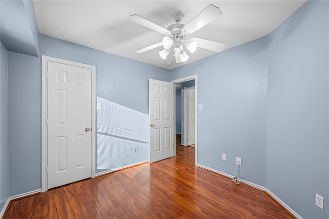 unfurnished bedroom with wood-type flooring and ceiling fan