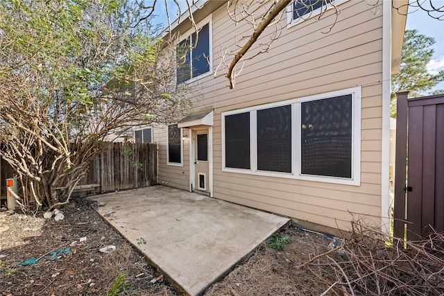 back of property with a patio area