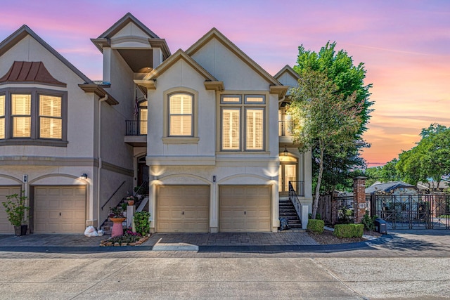 view of front of property with a garage