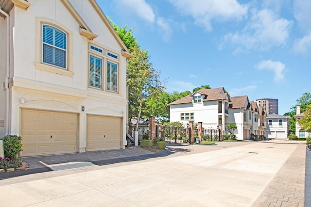 view of property exterior with a garage