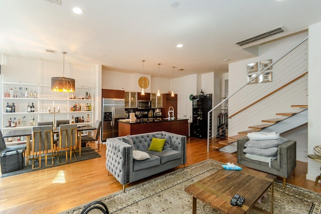 living room with hardwood / wood-style floors