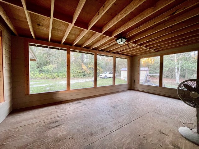 unfurnished sunroom with a wealth of natural light