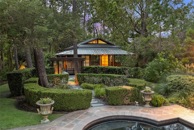 exterior space featuring a pergola